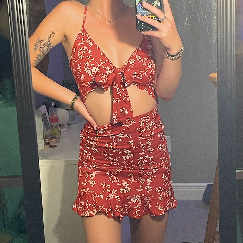 orangle front tie floral sun dress with ruffles on the bottom